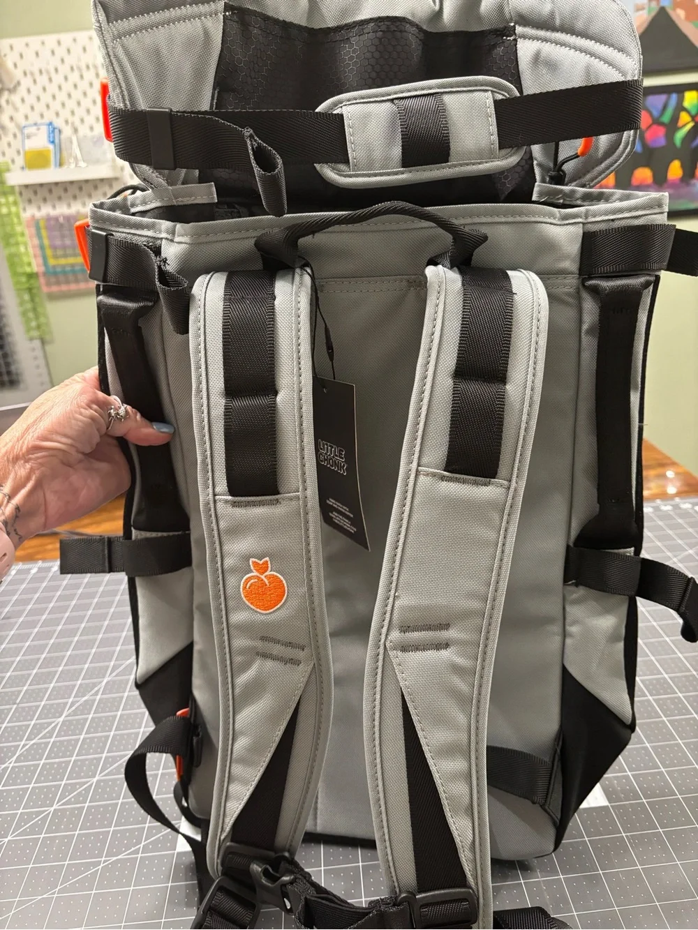 Little Chonk Maxine One Backpack with Orange Accents